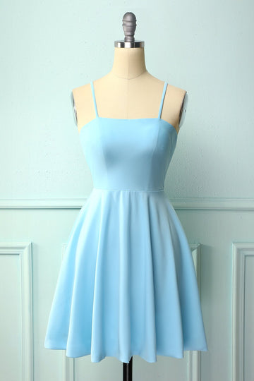 Robe de cocktail bleu dos nu